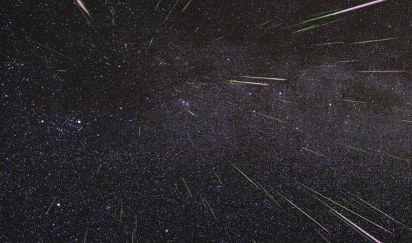 An outburst of Perseid meteors lights up the sky in August 2009 in this time-lapse image. Stargazers expect a similar outburst during next week’s Perseid meteor shower, which will be visible overnight on Aug. 11 and 12.