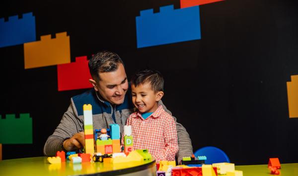 Family with Duplo bricks