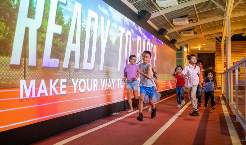 Kids running in SportsZone
