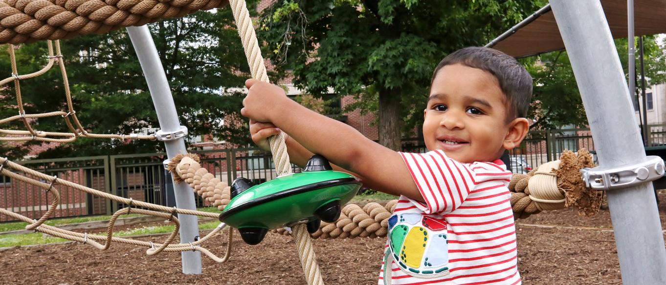 a smiling child in science park