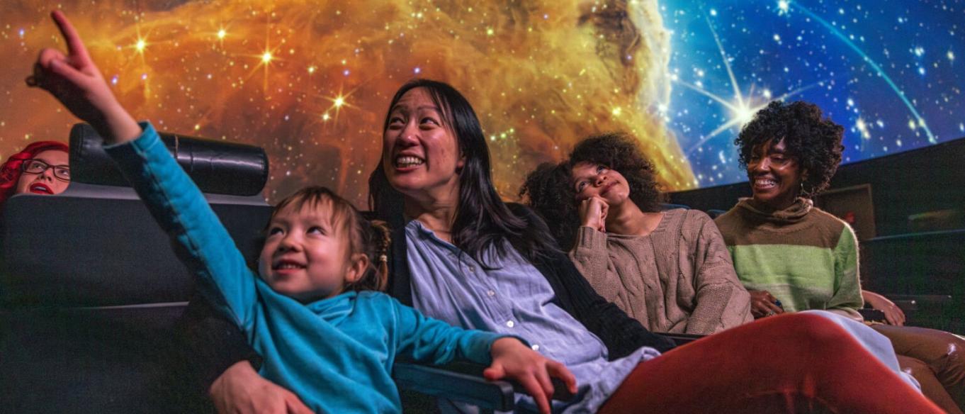 Family in planetarium