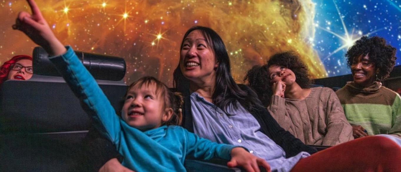 Family in planetarium