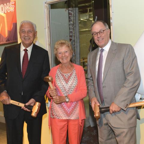 Lead donors Nicholas and Athena Karabots with Inspire Science! Chair Don Callaghan, breaking through to the new Nicholas and Athena Karabots Pavilion for the first time.