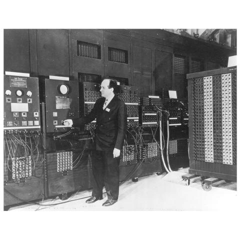 February of 1946 found Presper Eckert standing at the console of the ENIAC.