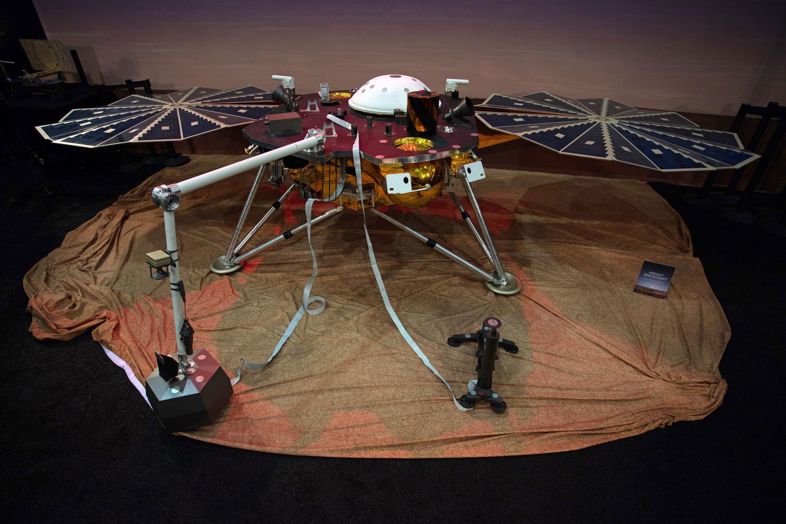 With deployed solar arrays, InSight is 19 feet wide (6 meters), just over 3 feet tall (~1 meter), and weighs only 790 pounds (358 kilograms). This is a full-scale model of lander. Photo: Jon Brack
