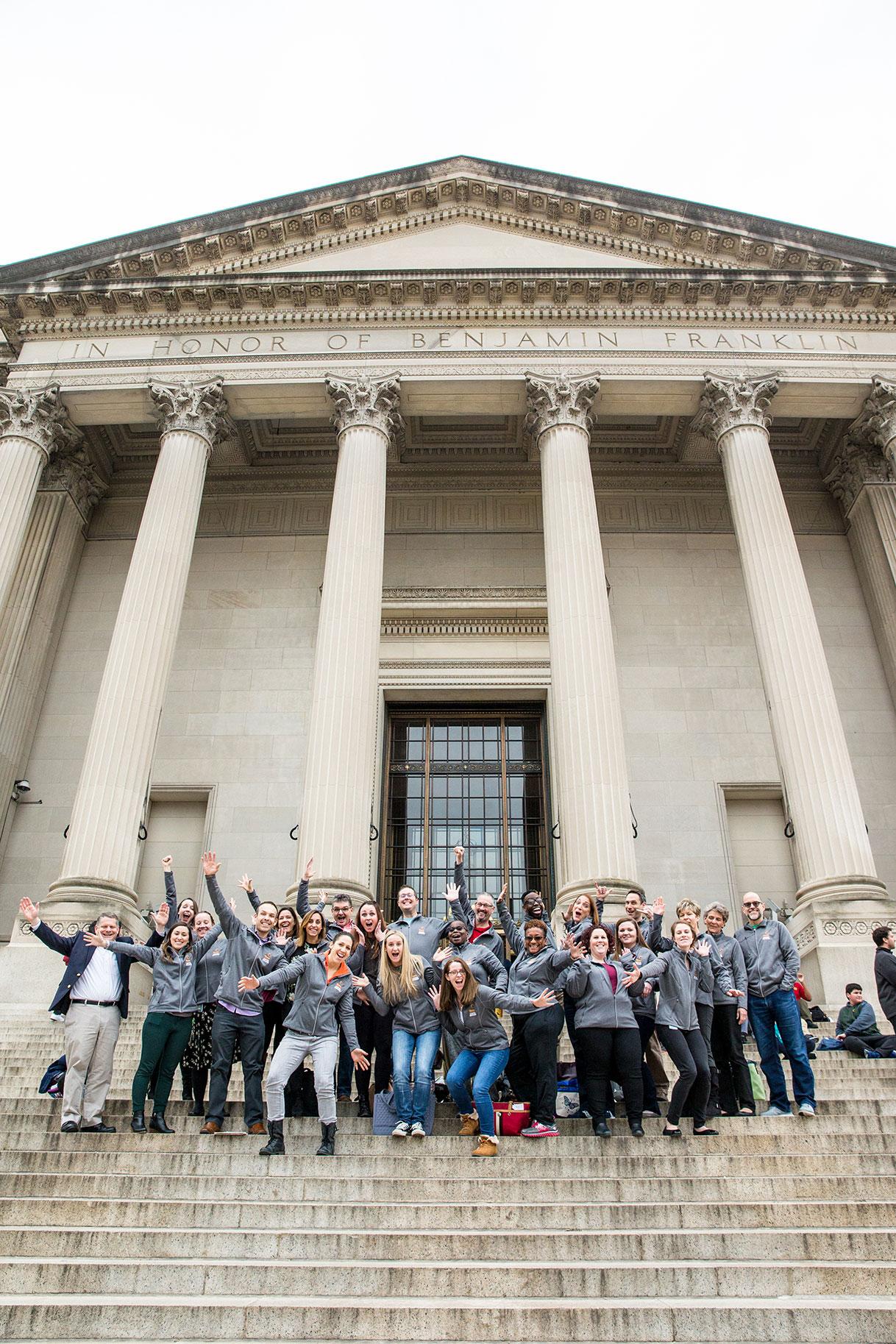 Master Educator Program participants gather on the steps of The Franklin Institute