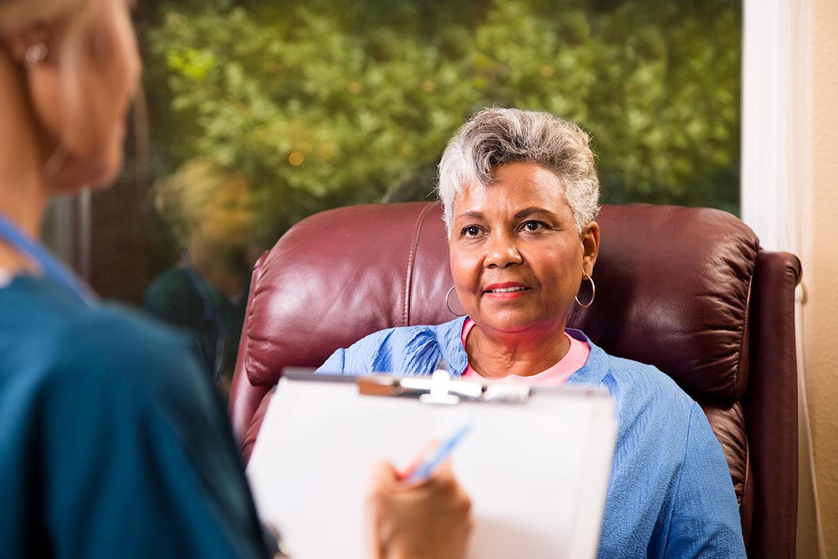 psychologist and patient sitting together