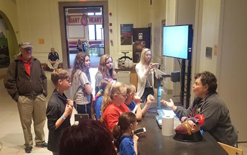 Franklin Institute Volunteer Shelly at the Heart Dissection Cart
